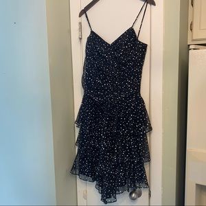 Gorgeous spaghetti strap dress with lace up back and tiered skirt. Vintage!